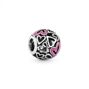 Ażurowy charms Pandora z różowym asymetrycznym sercem 798677C01