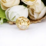 Charms Pandora Ażurowe słońce 768778C01