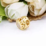 Charms Pandora Ażurowe słońce 768778C01