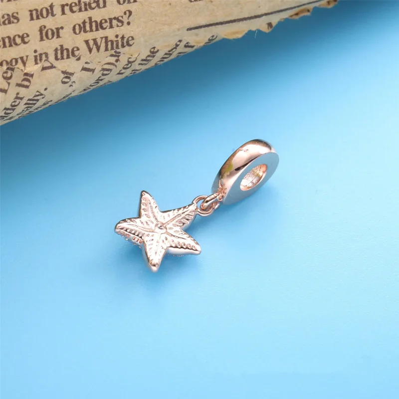 (zdjęcie do) Zawieszka lsniaca rozgwiazda - Wyświetl 4