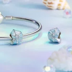 Niebieska zawieszka w kształcie muszli PANDORA Style - BSC1018
