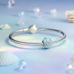 Niebieska zawieszka w kształcie muszli PANDORA Style - BSC1018