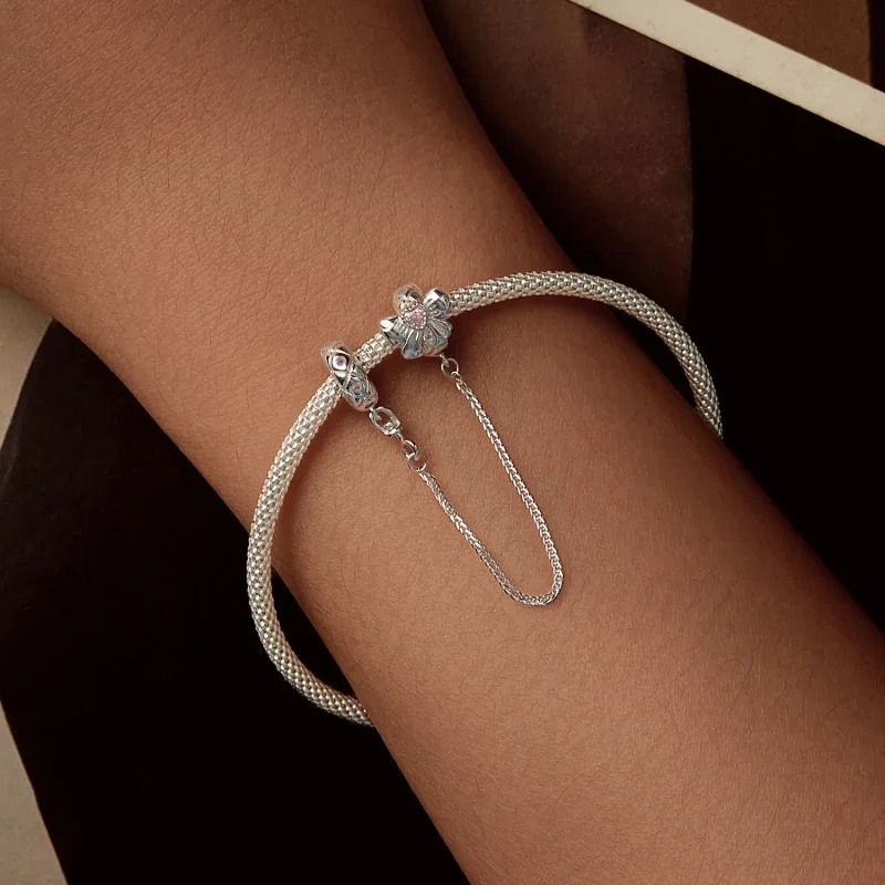 (zdjęcie do) Łańcuszek zabezpieczający PANDORA Style Bow Silicone - BSC1053 - Wyświetl 5