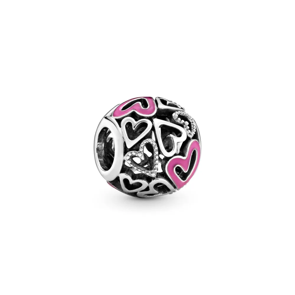 Ażurowy charms Pandora z różowym asymetrycznym sercem 798677C01